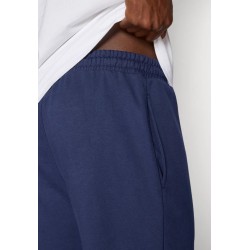 PANTALÓN LARGO azul REEBOK ANDRE SMALL LOGO CUFFED navy hombre  100240235